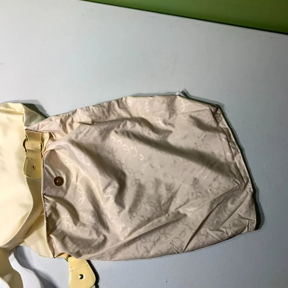 $5 or 4/$10: Cooei Pale Yellow Folding Nylon Bag and flip flops set NWT